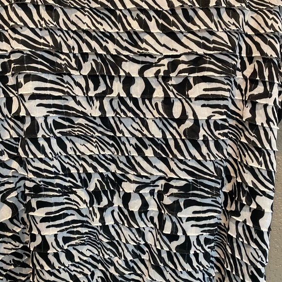 Black and white tank top with ruffle front and all black back. Like new. - Picture 2 of 3